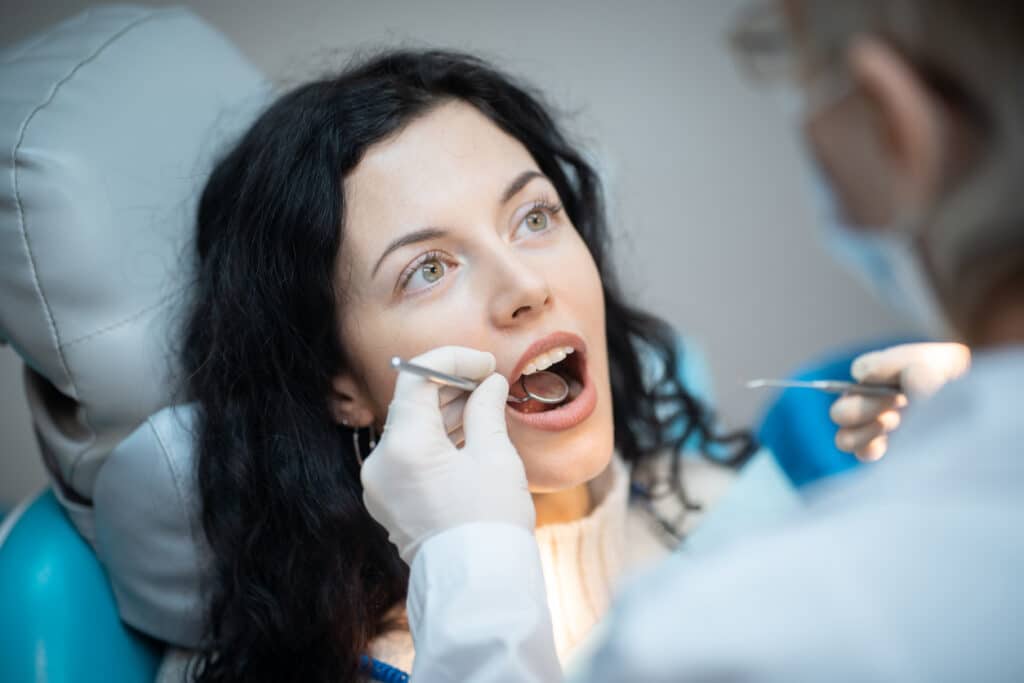 Female undergoing dental exam