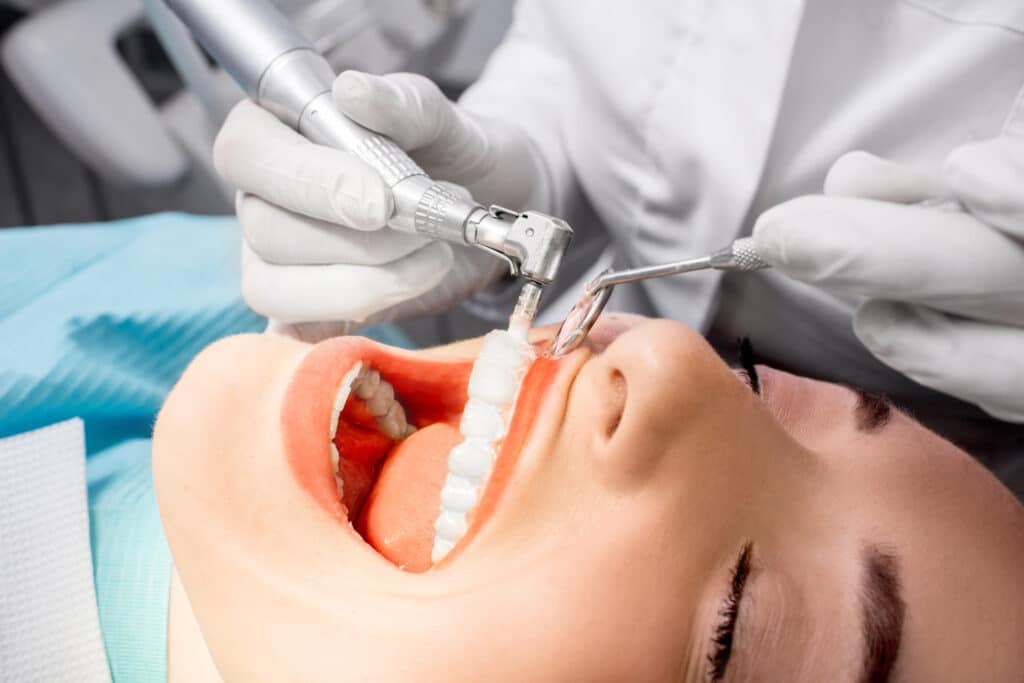 Patient receiving a teeth cleaning