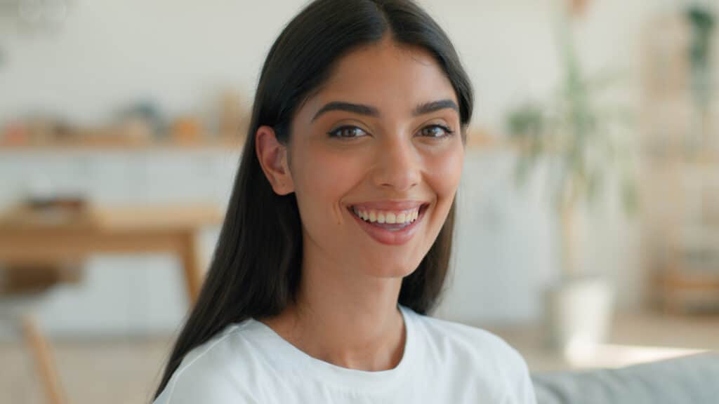 Woman with striaght teeth smiling