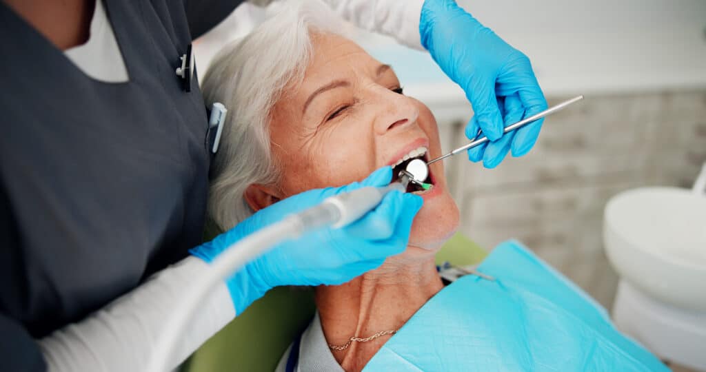 Patient receiving a dental cleanign