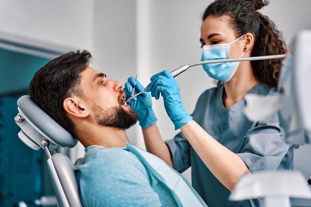 Patient receiving dental treatment