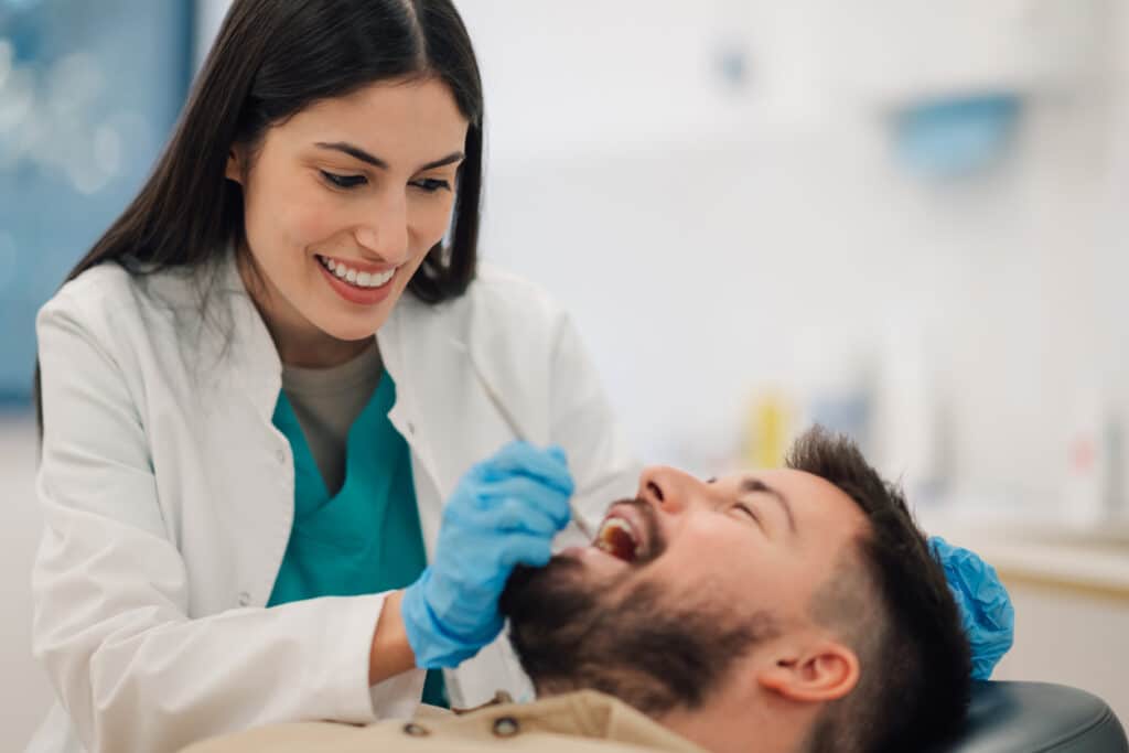 Pateint receiving a dental cleaning from a trustworthy dentist