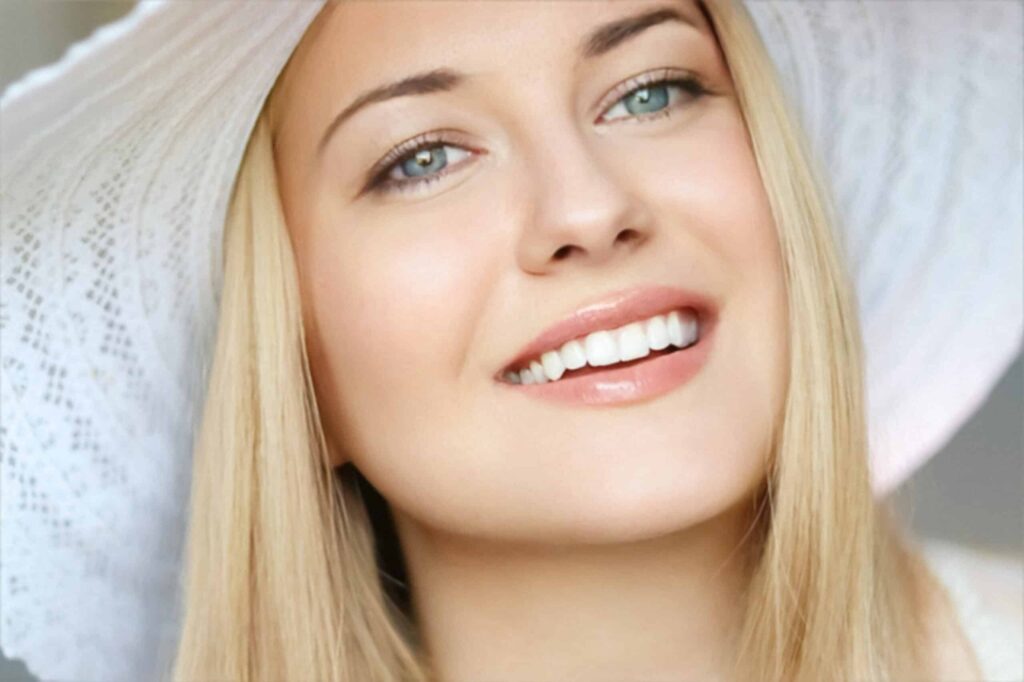 Patient with nice teeth after a comprehensive dental exam