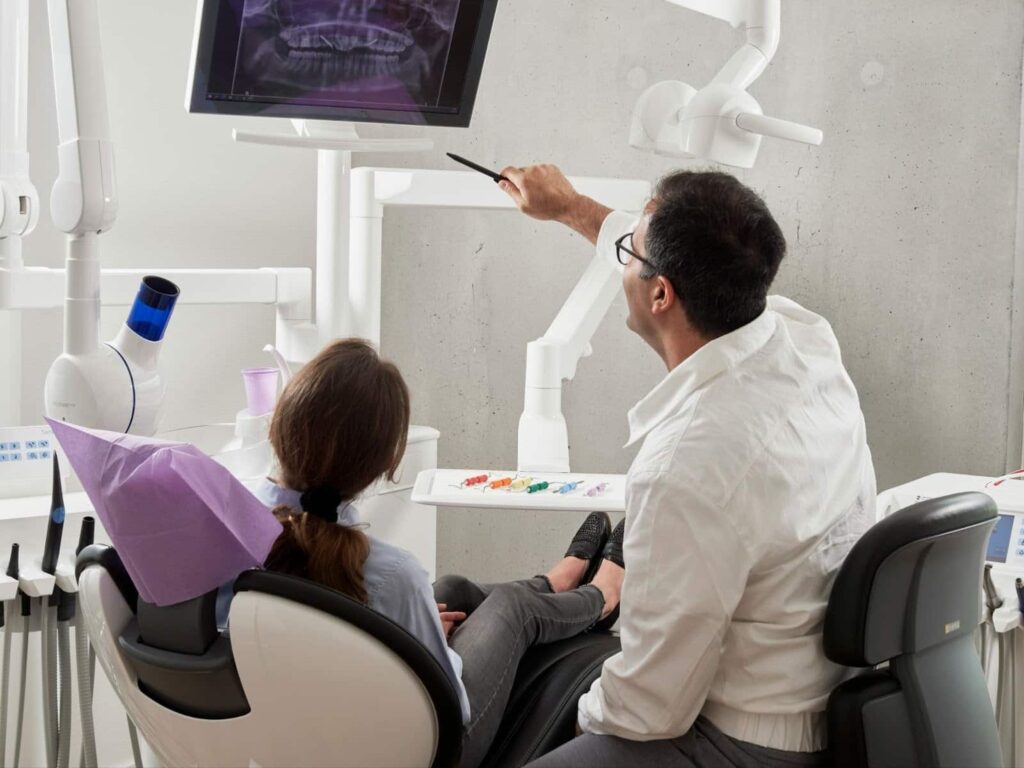 A dental patient visiting the dentist after missing for meany years
